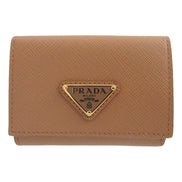 Prada Saffiano Leather Trifold Wallet Enamel Triangle Logo Natural Brown available at Queen Bee of Beverly Hills