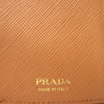 Prada Saffiano Leather Trifold Wallet Enamel Triangle Logo Natural Brown available at Queen Bee of Beverly Hills