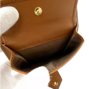 Prada City Calf Leather Snap Bifold Wallet Caramel Brown available at Queen Bee of Beverly Hills