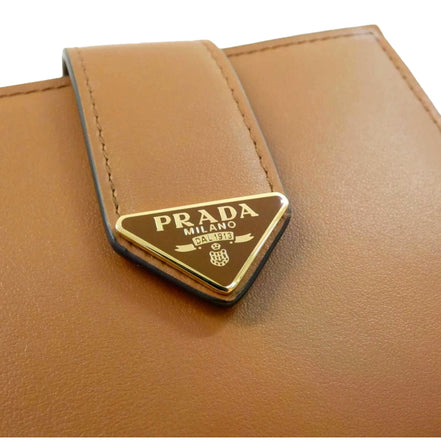 Prada City Calf Leather Snap Bifold Wallet Caramel Brown available at Queen Bee of Beverly Hills