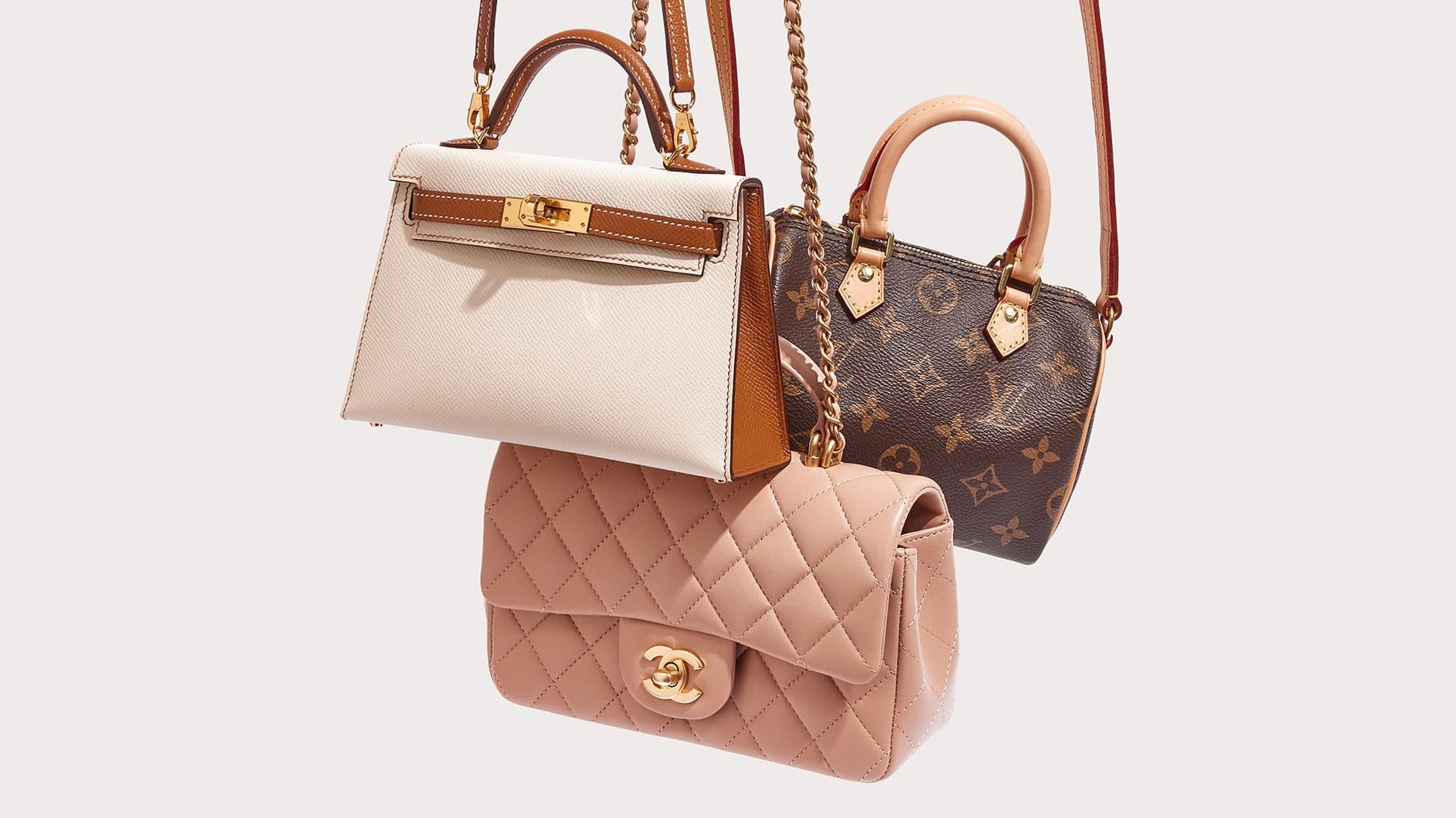 Hermes, Louis Vuitton and Chanel Bag hanging together. 