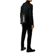 Bottega Veneta Perforated Black Leather Drawstring Bucket Crossbody Bag available at Queen Bee of Beverly Hills