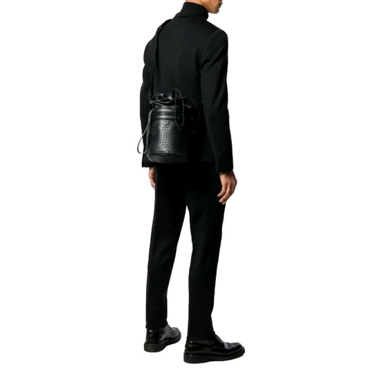 Bottega Veneta Perforated Black Leather Drawstring Bucket Crossbody Bag available at Queen Bee of Beverly Hills