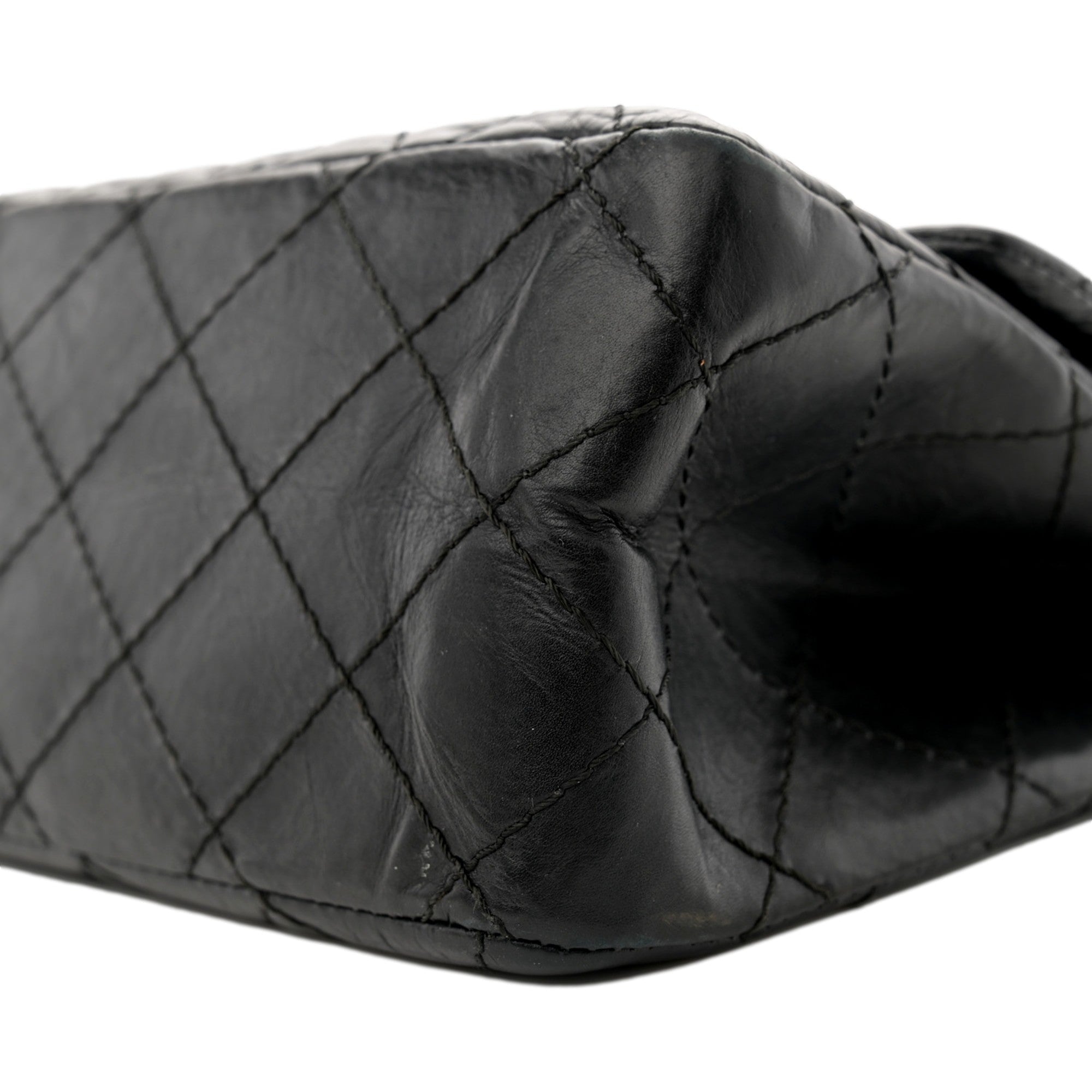 Chanel Black Aged Calfskin Quilted 2.55 Reissue 225 Flap Handbag With Chain available at Queen Bee of Beverly Hills