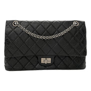 Chanel Black Aged Calfskin Quilted 2.55 Reissue 225 Flap Handbag With Chain available at Queen Bee of Beverly Hills
