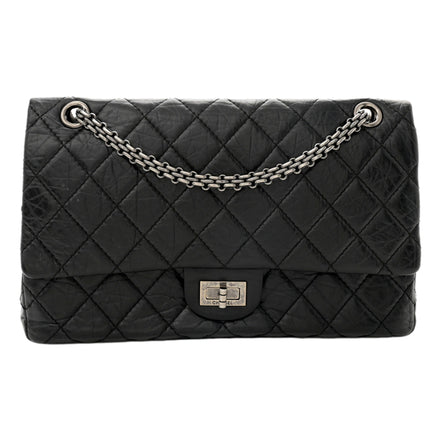 Chanel Black Aged Calfskin Quilted 2.55 Reissue 225 Flap Handbag With Chain available at Queen Bee of Beverly Hills