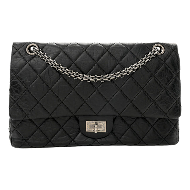 Chanel Black Aged Calfskin Quilted 2.55 Reissue 225 Flap Handbag With Chain available at Queen Bee of Beverly Hills