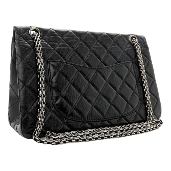 Chanel Black Aged Calfskin Quilted 2.55 Reissue 225 Flap Handbag With Chain available at Queen Bee of Beverly Hills