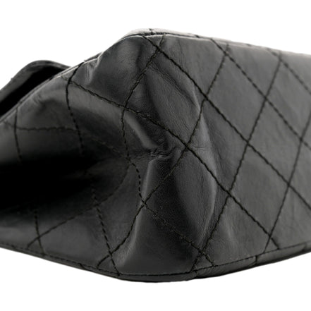 Chanel Black Aged Calfskin Quilted 2.55 Reissue 225 Flap Handbag With Chain available at Queen Bee of Beverly Hills