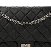 Chanel Black Aged Calfskin Quilted 2.55 Reissue 225 Flap Handbag With Chain available at Queen Bee of Beverly Hills