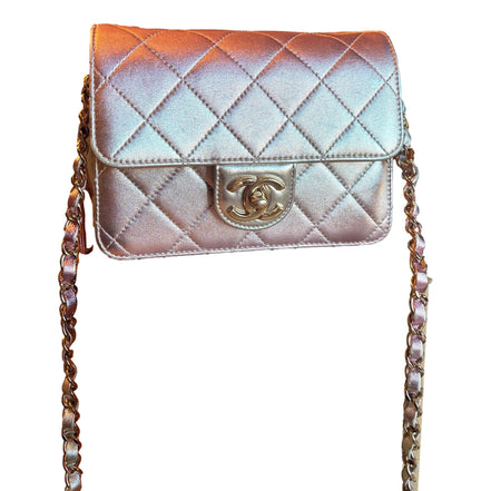 Chanel Mini Flap Bag in Iridescent Pink & Silver Metallic Lambskin available at Queen Bee of Beverly Hills