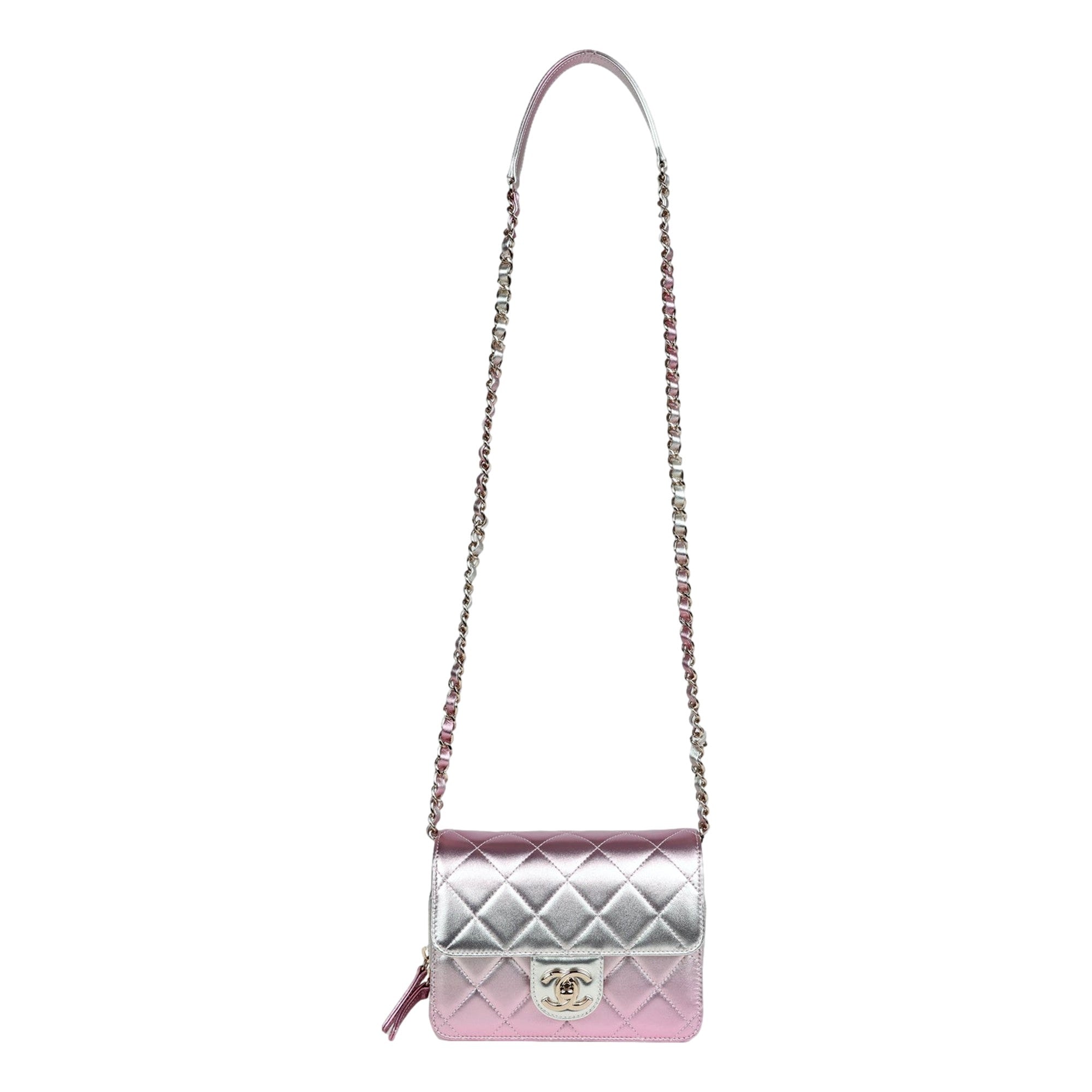 Chanel Mini Flap Bag in Iridescent Pink & Silver Metallic Lambskin available at Queen Bee of Beverly Hills