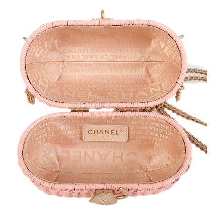 Chanel Pink Oval Wicker Heart CC Charm Closure 2-Way Handle Crossbody Bag available at Queen Bee of Beverly Hills