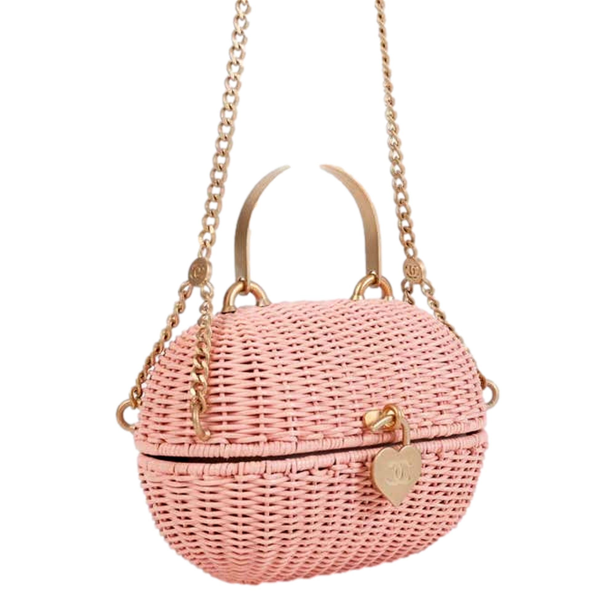 Chanel Pink Oval Wicker Heart CC Charm Closure 2-Way Handle Crossbody Bag available at Queen Bee of Beverly Hills