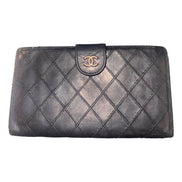 Chanel Vintage Interlocking CC Black Lambskin Quilted Wallet with Coin Compartment available at Queen Bee of Beverly Hills