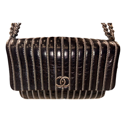 Chanel White Vertical Stitch Black Flap Bag available at Queen Bee of Beverly Hills