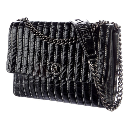 Chanel White Vertical Stitch Black Flap Bag available at Queen Bee of Beverly Hills