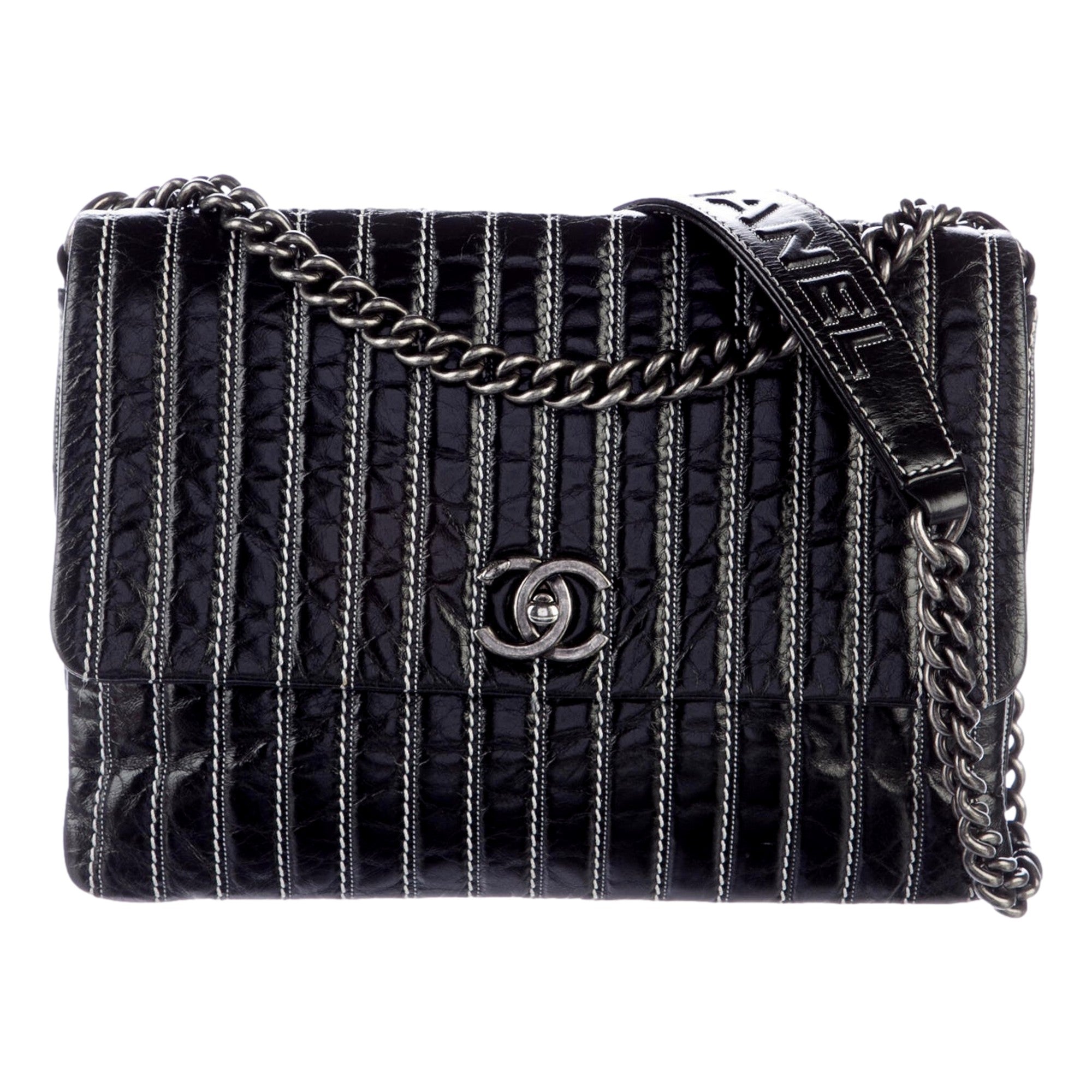 Chanel White Vertical Stitch Black Flap Bag available at Queen Bee of Beverly Hills