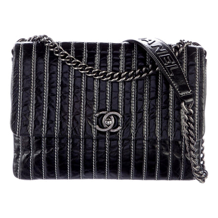 Chanel White Vertical Stitch Black Flap Bag available at Queen Bee of Beverly Hills
