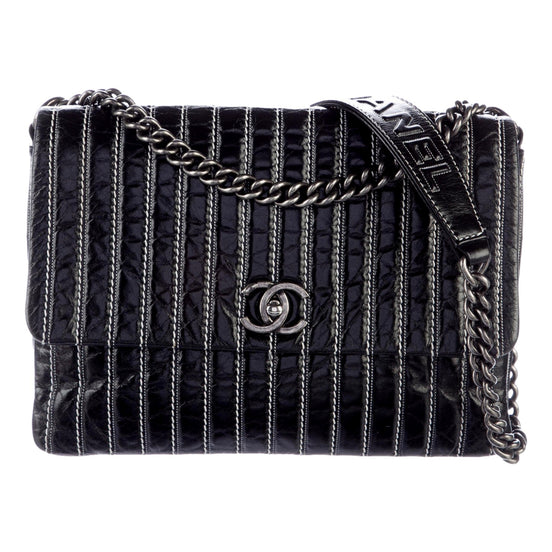Chanel White Vertical Stitch Black Flap Bag available at Queen Bee of Beverly Hills