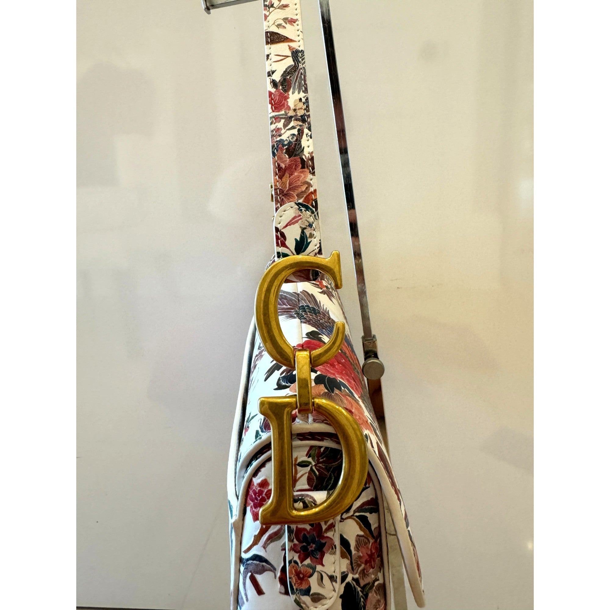 Dior Rare Floral and Bird Print Leather Saddle Bag Gold Detailing available at Queen Bee of Beverly Hills