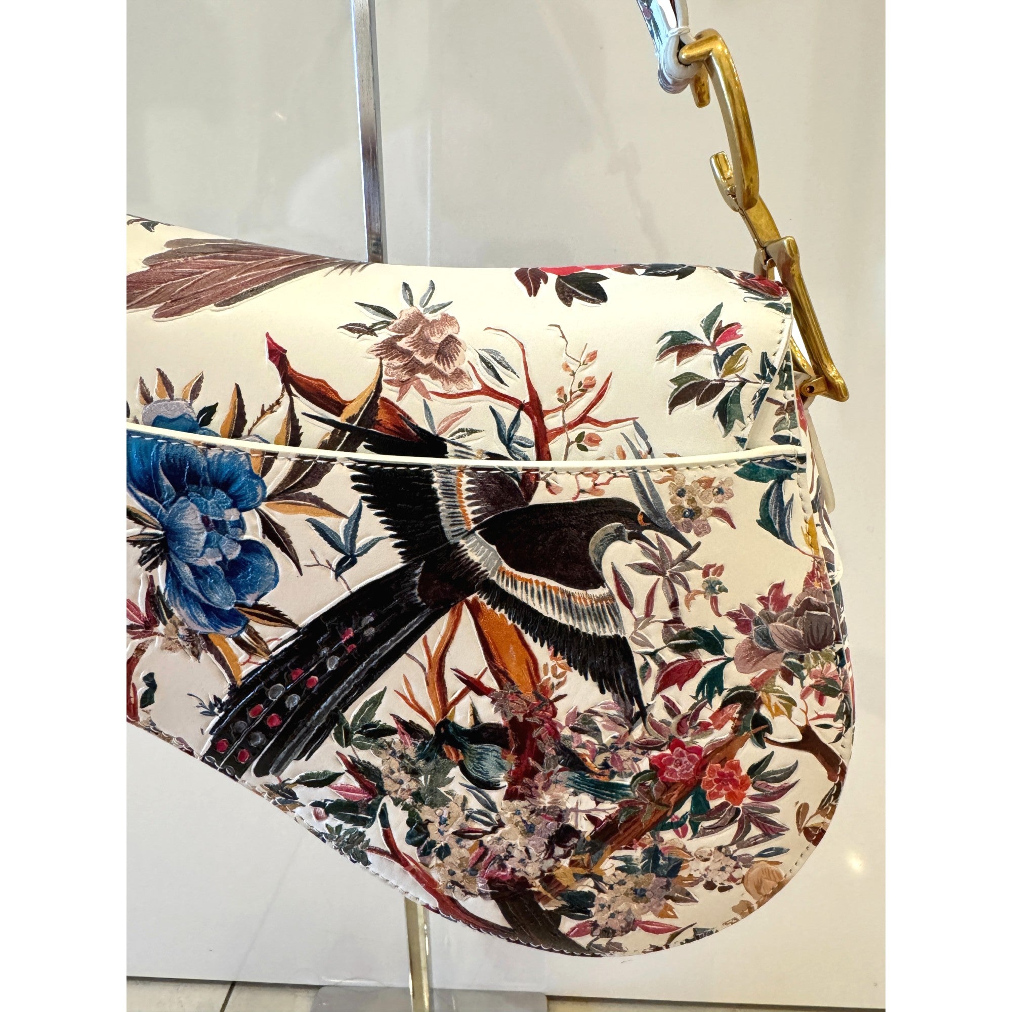 Dior Rare Floral and Bird Print Leather Saddle Bag Gold Detailing available at Queen Bee of Beverly Hills