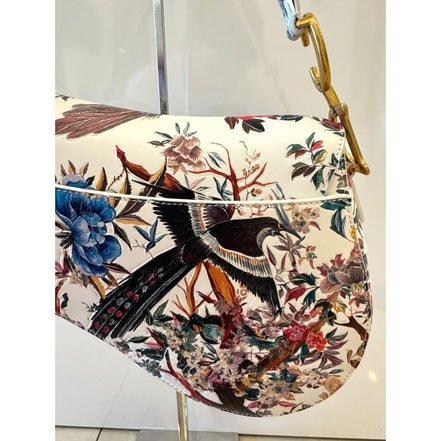 Dior Rare Floral and Bird Print Leather Saddle Bag Gold Detailing available at Queen Bee of Beverly Hills