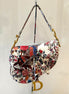 Dior Rare Floral and Bird Print Leather Saddle Bag Gold Detailing available at Queen Bee of Beverly Hills