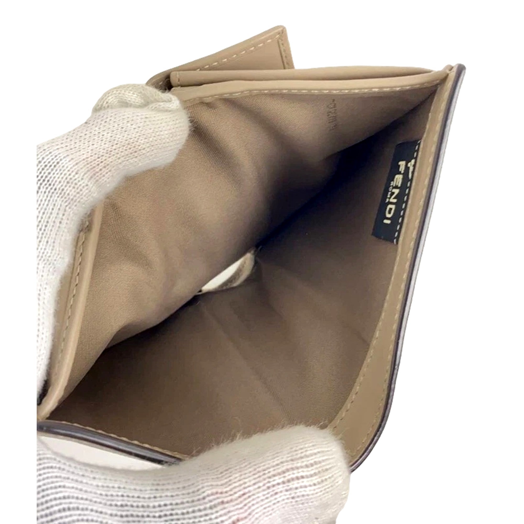 Fendi F is Fendi Tortora Gray Leather Bifold Wallet available at Queen Bee of Beverly Hills