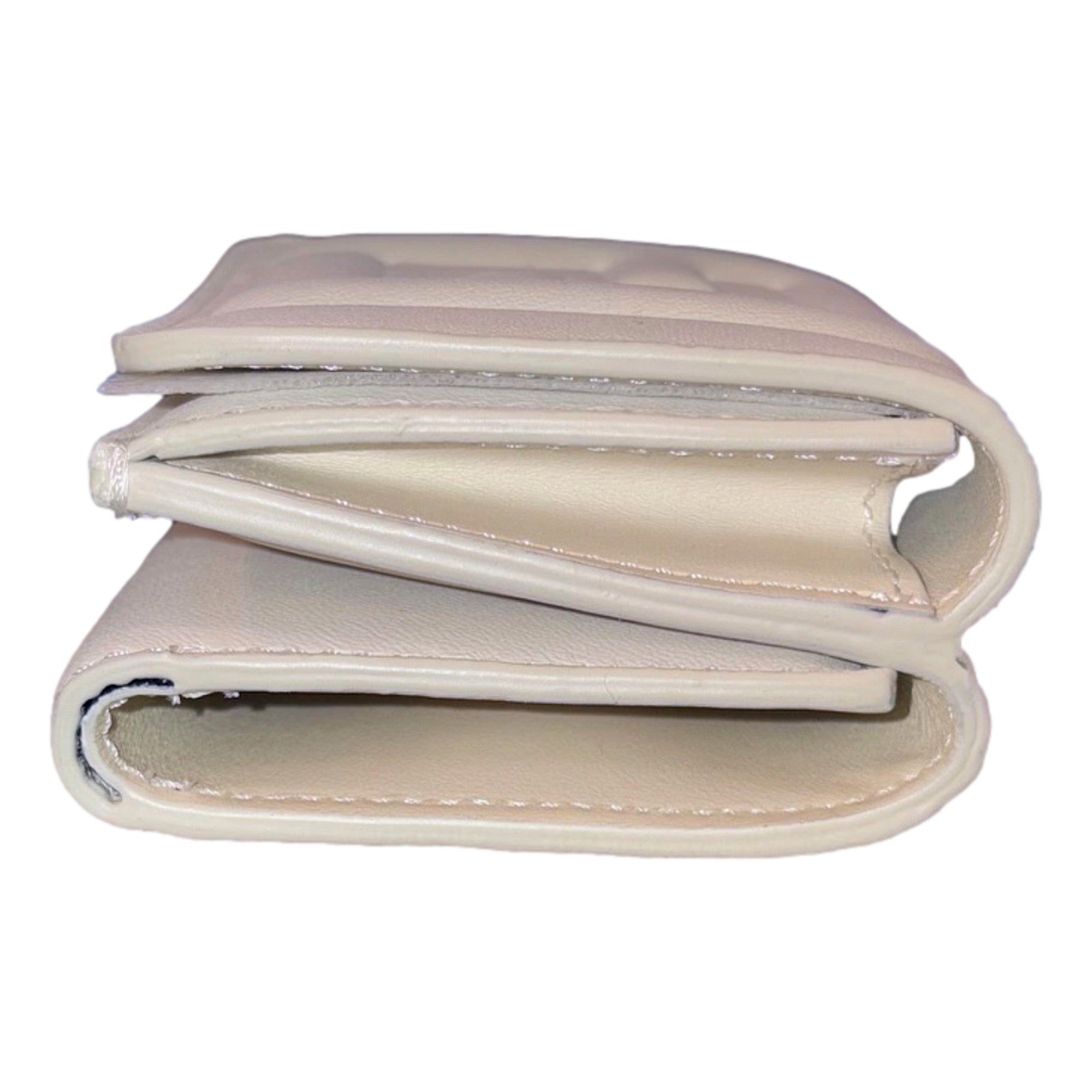 Fendi FF Cube Embossed Logo Bianco Ice White Leather Trifold available at Queen Bee of Beverly Hills