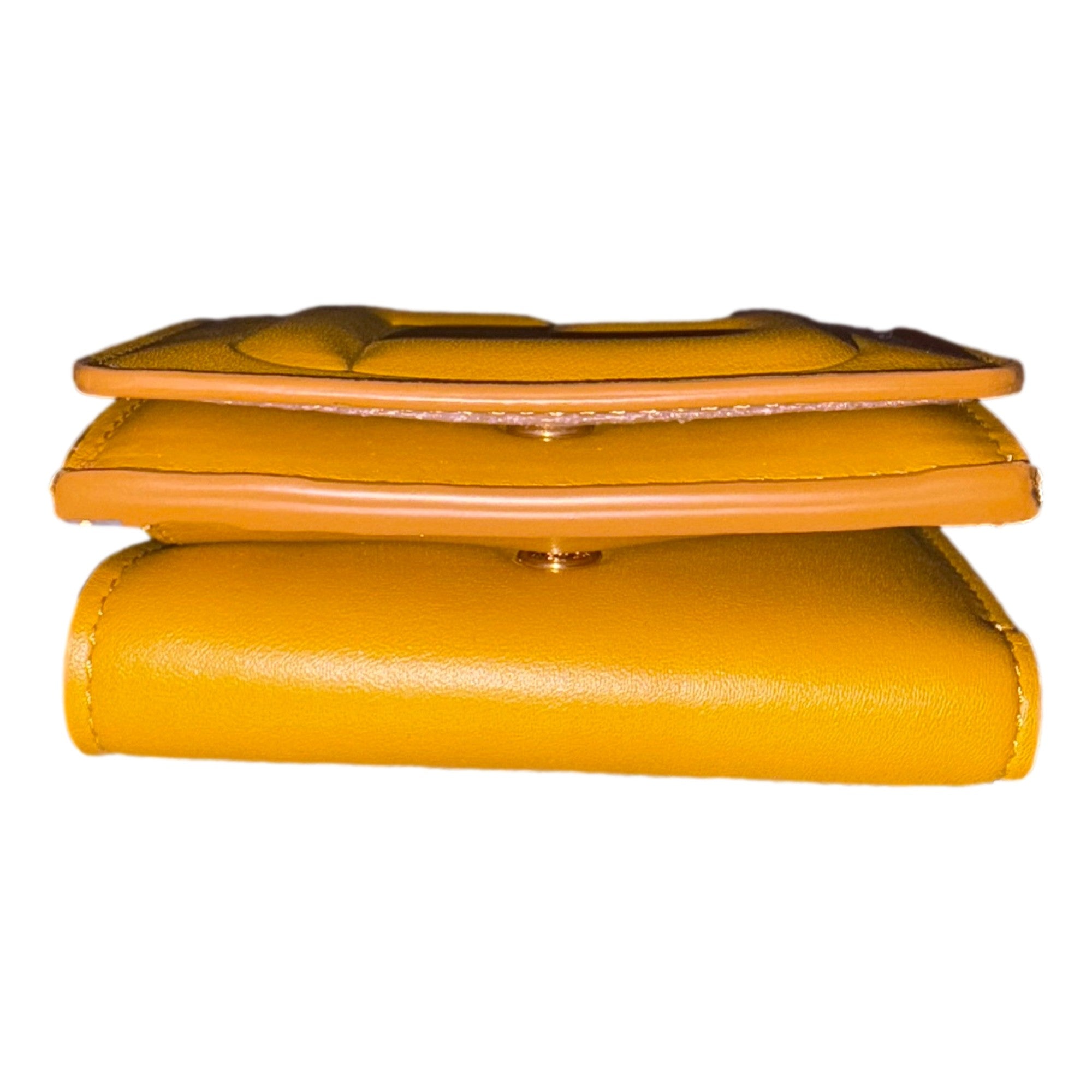 Fendi FF Cube Embossed Logo Oro Yellow Leather Trifold available at Queen Bee of Beverly Hills
