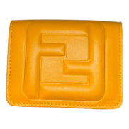 Fendi FF Cube Embossed Logo Oro Yellow Leather Trifold available at Queen Bee of Beverly Hills