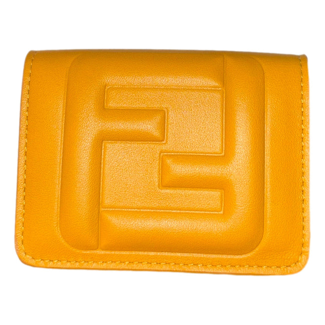 Fendi FF Cube Embossed Logo Oro Yellow Leather Trifold available at Queen Bee of Beverly Hills
