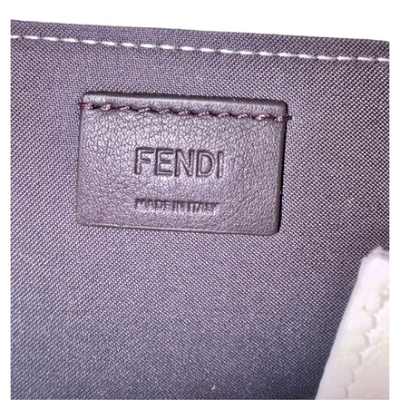 Fendi FF Cube Embossed Small Zip Wallet Bianco White Leather with Strap available at Queen Bee of Beverly Hills