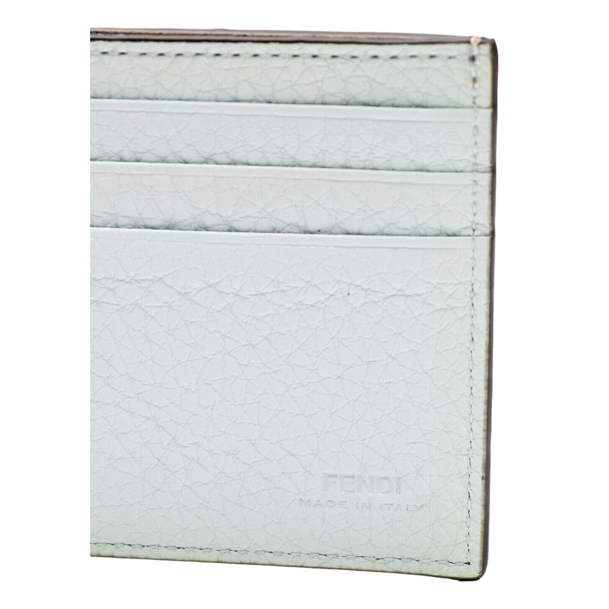 Fendi FF Logo Plaque Light Gray and Blue Pebbled Calf Leather Bifold Wallet available at Queen Bee of Beverly Hills
