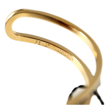 Fendi FF O Lock Gold Tone Metal Cuff Bracelet available at Queen Bee of Beverly Hills