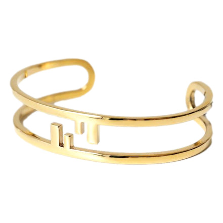 Fendi FF O Lock Gold Tone Metal Cuff Bracelet available at Queen Bee of Beverly Hills