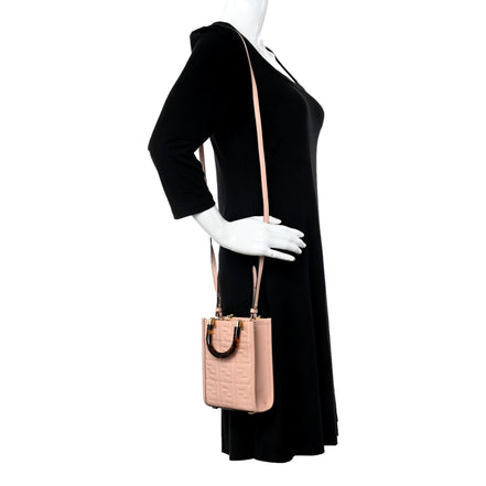 Fendi FF Zucca Leather Mini Sunshine Shopper Tote Crossbody Bag Baby Pink available at Queen Bee of Beverly Hills