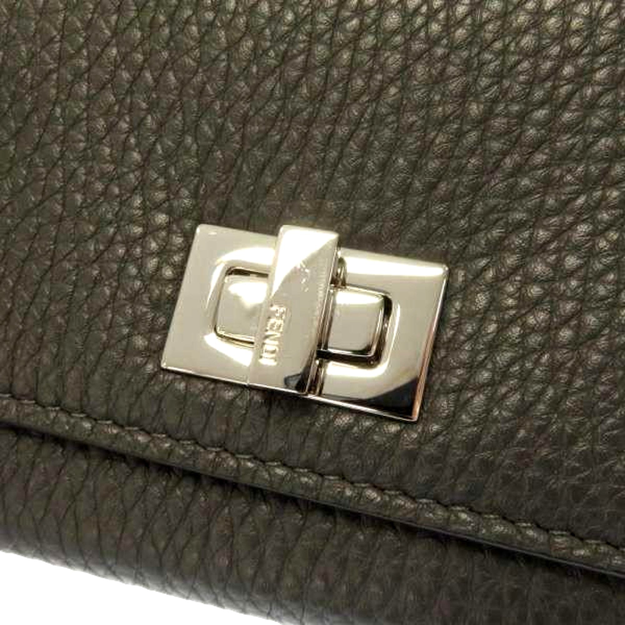 Fendi Peekaboo Turn Lock Black Grained Leather Continental Long Wallet sold at Queen Bee of Beverly Hills
