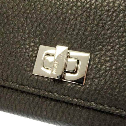 Fendi Peekaboo Turn Lock Black Grained Leather Continental Long Wallet sold at Queen Bee of Beverly Hills