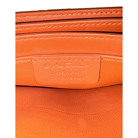 Ferragamo Trifolio Soft Leather Flap Crossbody Bag Cognac Brown available at Queen Bee of Beverly Hills