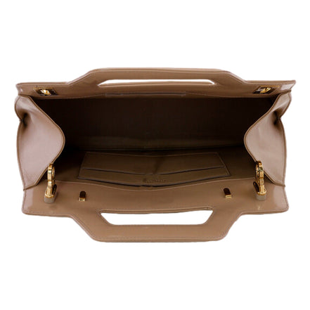 Ferragamo Wanda Beige Patent Leather Top Handle Handbag available at Queen Bee of Beverly Hills