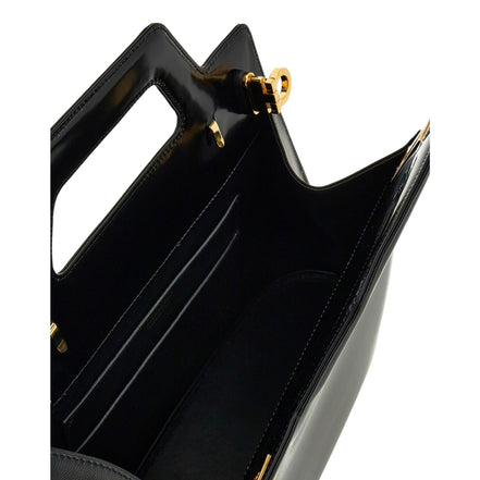 Ferragamo Wanda Black Patent Leather Top Handle Handbag available at Queen Bee of Beverly Hills