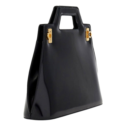 Ferragamo Wanda Black Patent Leather Top Handle Handbag available at Queen Bee of Beverly Hills