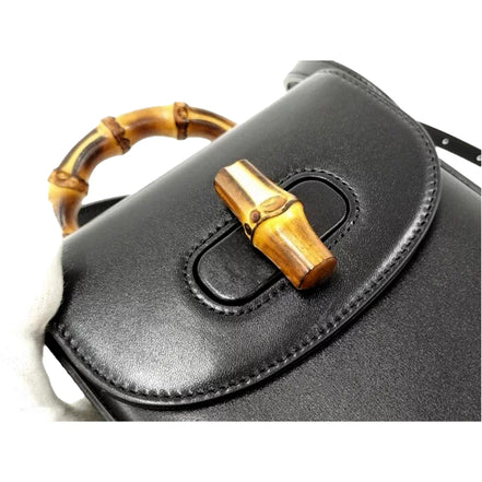 Gucci Bamboo Mini Handbag Top Handle Bag in Black Leather available at Queen Bee of Beverly Hills