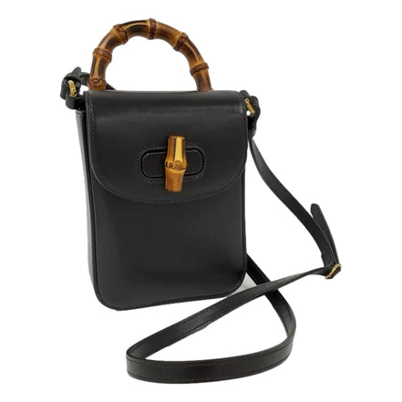 Gucci Bamboo Mini Handbag Top Handle Bag in Black Leather available at Queen Bee of Beverly Hills
