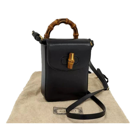 Gucci Bamboo Mini Handbag Top Handle Bag in Black Leather available at Queen Bee of Beverly Hills