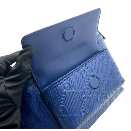 Gucci Calfskin GG Tennis Embossed Pocket Belt Bag Blue available at Queen Bee of Beverly Hills