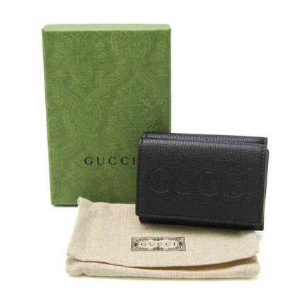 Gucci Embossed Logo Mini Tri-Fold Wallet Black Pebbled Leather available at Queen Bee of Beverly Hills