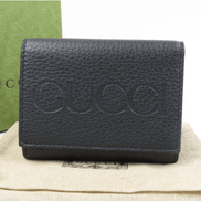 Gucci Embossed Logo Mini Tri-Fold Wallet Black Pebbled Leather available at Queen Bee of Beverly Hills